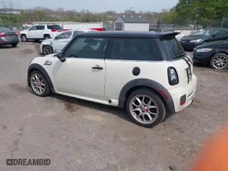 2008 MINI Cooper Hardtop S with VIN WMWMF73578TV33406, listed as a IAAI auction lot 42081596 with 120,183 mi miles. Bid and sale history available at carsss.com. Image 3.