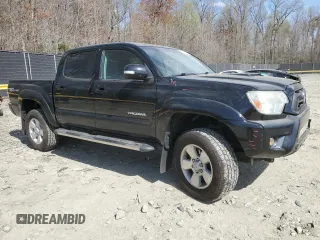 2014 Toyota Tacoma PreRunner with VIN 5TFJU4GN7EX051530, listed as a Copart auction lot 51135655 with 117,157 mi miles and Salvage Title. Bid and sale history available at DreamBid. Image 4.