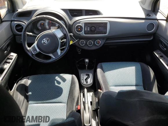 2012 Toyota Yaris L with VIN JTDKTUD34CD505077, listed as a Copart auction lot 63422445 with 141,067 mi miles and Salvage title. Bid and sale history available at DreamBid. Image 8.