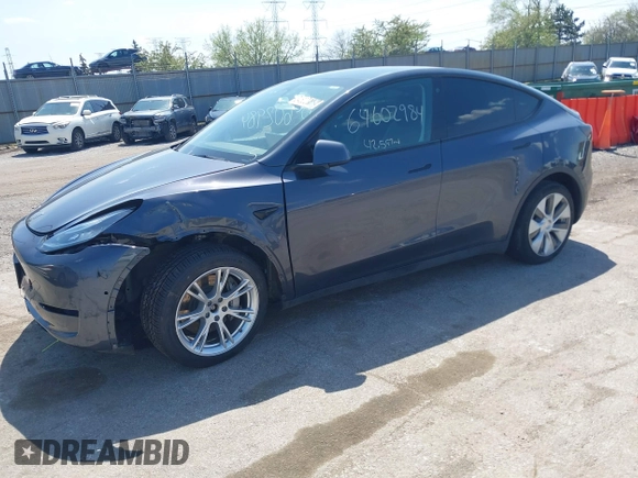 2022 Tesla Model Y Long Range with VIN 7SAYGDEE3NA007737, listed as a IAAI auction lot 42128359 with 42,597 mi miles and . Bid and sale history available at carsss.com. Image 20.