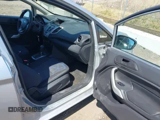 2013 Ford Fiesta SE with VIN 3FADP4EJ9DM157685, listed as a IAAI auction lot 42145511 with 101,331 mi miles. Bid and sale history available at carsss.com. Image 5.