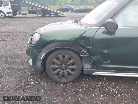 2019 MINI Countryman Cooper S z VIN WMZYT5C5XK3G94330, wystawiony jako IAAI lot #42310854 z przebiegiem 64 396 mil mil oraz . Historia ofert i sprzedaży dostępna na DreamBid. Obrazek 6.