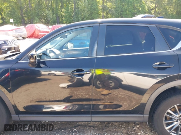 2017 Mazda CX-5 Touring z VIN JM3KFBCL0H0209458, wystawiony jako IAAI lot #42169599 z przebiegiem 93 287 mil mil oraz . Historia ofert i sprzedaży dostępna na DreamBid. Obrazek 14.