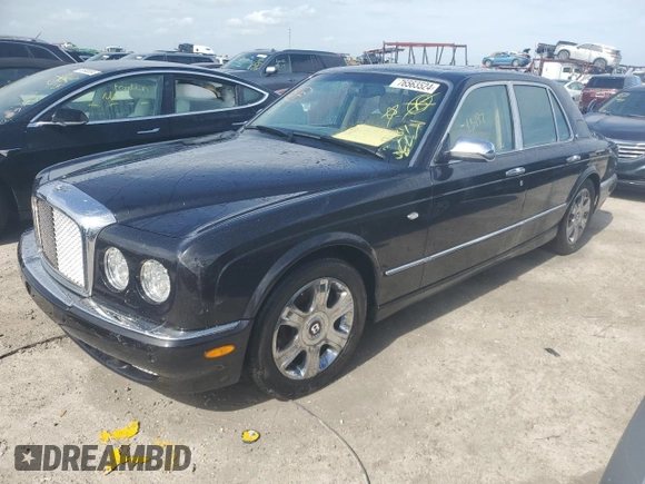2006 Bentley Arnage R с VIN SCBLC37F26CX11385, выставлен на аукционе Copart как лот 76563524 с пробегом 23 197 миль миль и Списание • Salvage title. История ставок и продаж доступна на DreamBid. Изображение 1.