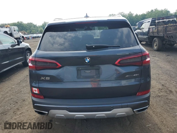 2019 BMW X5 xDrive40i with VIN 5UXCR6C57KLL11051, listed as a Copart auction lot 60268695 with 169,671 mi miles and Salvage title. Bid and sale history available at DreamBid. Image 6.
