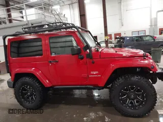 2011 Jeep Wrangler Sahara with VIN 1J4AA5D10BL593534, listed as a IAAI auction lot 41551416 with 101,716 mi miles and . Bid and sale history available at DreamBid. Image 13.