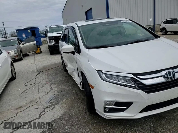 2020 Honda Odyssey Touring with VIN 5FNRL6H8XLB019365, listed as a Copart auction lot 52404335 with 59,486 mi miles and Salvage Title. Bid and sale history available at DreamBid. Image 14.