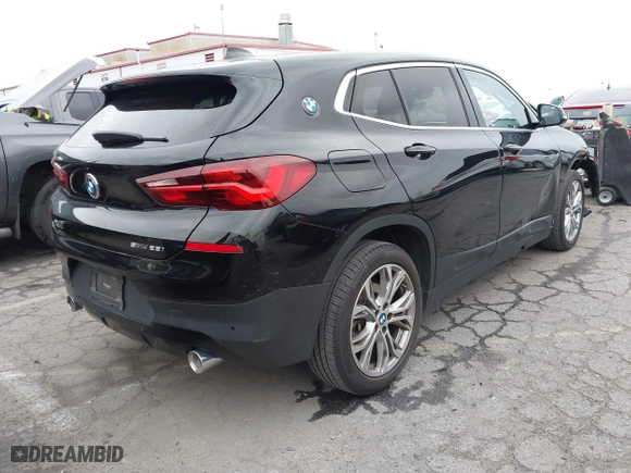 2020 BMW X2 sDrive28i with VIN WBXYH9C08L5R62746, listed as a IAAI auction lot 41788571 with 20,981 mi miles. Bid and sale history available at carsss.com. Image 4.