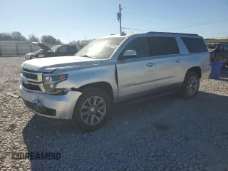 2018 Chevrolet Suburban LT with VIN 1GNSCHKC5JR162104, listed as a Copart auction lot 46587215 with 133,018 mi miles and Salvage Title. Bid and sale history available at carsss.com. Image 1.