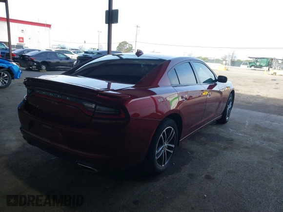 2019 Dodge Charger SXT with VIN 2C3CDXJG0KH757909, listed as a IAAI auction lot 41597907 with 71,882 mi miles and . Bid and sale history available at DreamBid. Image 4.