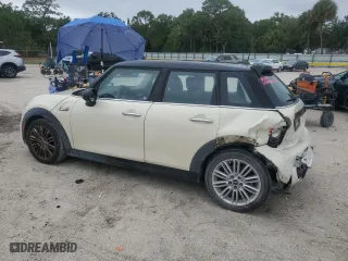 2015 MINI Cooper Hardtop 4 Door S with VIN WMWXU3C59F2B56806, listed as a Copart auction lot 52383055 with 147,817 mi miles and Salvage Title. Bid and sale history available at carsss.com. Image 2.