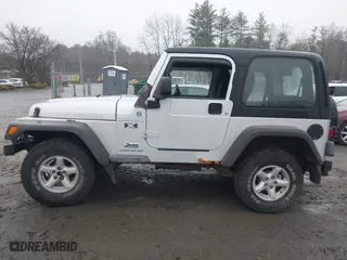 2006 Jeep Wrangler X with VIN 1J4FA39SX6P709588, listed as a IAAI auction lot 41927435 with 227,990 mi miles. Bid and sale history available at carsss.com. Image 14.