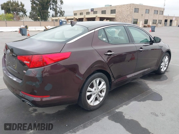 2013 Kia Optima LX z VIN 5XXGM4A72DG208410, wystawiony jako IAAI lot #42078867 z przebiegiem 89 033 mil mil oraz . Historia ofert i sprzedaży dostępna na DreamBid. Obrazek 4.