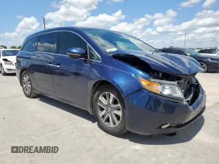 2014 Honda Odyssey Touring with VIN 5FNRL5H97EB037439, listed as a Copart auction lot 62782035 with 153,315 mi miles and Salvage title. Bid and sale history available at DreamBid. Image 4.