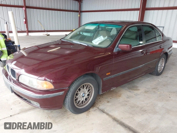 1997 BMW 5 Series 528iA with VIN WBADD6323VBW15656, listed as a IAAI auction lot 41777667 with 142,443 mi miles. Bid and sale history available at carsss.com. Image 2.