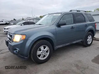 2010 Ford Escape XLT with VIN 1FMCU0DG2AKD33309, listed as a Copart auction lot 51435245 with 120,638 mi miles and Salvage Title. Bid and sale history available at carsss.com. Image 1.