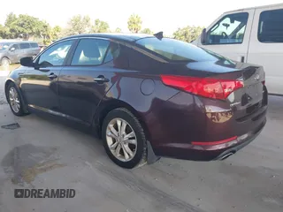 2013 Kia Optima EX z VIN 5XXGN4A71DG142137, wystawiony jako IAAI lot #42681081 z przebiegiem 115 892 mil mil oraz . Historia ofert i sprzedaży dostępna na DreamBid. Obrazek 3.