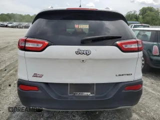 2014 Jeep Cherokee Limited with VIN 1C4PJLDB1EW301647, listed as a Copart auction lot 56169585 with 140,784 mi miles and Salvage title. Bid and sale history available at DreamBid. Image 6.