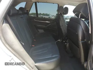 2015 BMW X5 xDrive35i z VIN 5UXKR0C52F0P12247, wystawiony jako Copart lot #54955465 z przebiegiem 87 315 mil mil oraz Szkoda całkowita • Salvage title. Historia ofert i sprzedaży dostępna na DreamBid. Obrazek 11.
