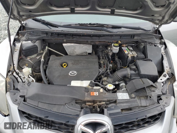 2010 Mazda CX-7 SV z VIN JM3ER2W53A0301123, wystawiony jako Copart lot #58711605 z przebiegiem 236 428 mil mil oraz Szkoda całkowita • Salvage title. Historia ofert i sprzedaży dostępna na DreamBid. Obrazek 11.