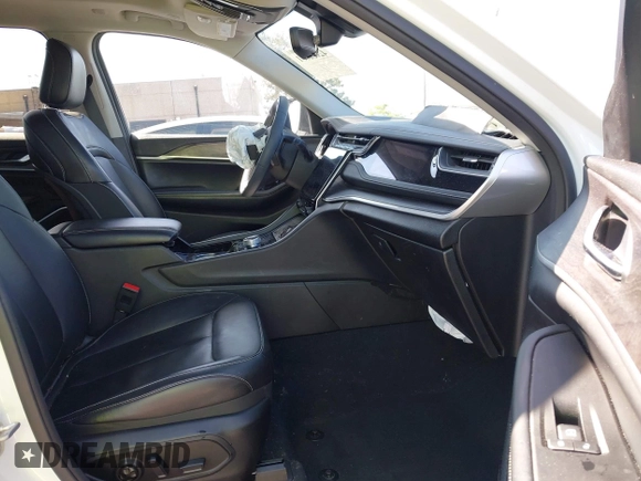 2022 Jeep Grand Cherokee with VIN 1C4RJYB66N8718018, listed as a IAAI auction lot 42002051 with Not provided miles and . Bid and sale history available at DreamBid. Image 5.