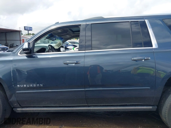2019 Chevrolet Suburban Premier z VIN 1GNSCJKC0KR139323, wystawiony jako IAAI lot #42100758 z przebiegiem Nie podano mil oraz . Historia ofert i sprzedaży dostępna na DreamBid. Obrazek 14.