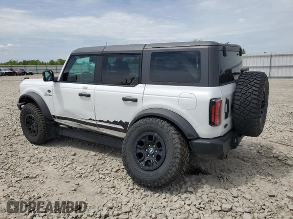 2022 Ford Bronco with VIN 1FMEE5DP4NLB67541, listed as a Copart auction lot 58427485 with 67,774 mi miles and Salvage title. Bid and sale history available at DreamBid. Image 2.