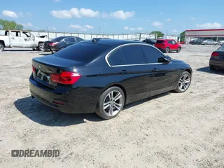 2018 BMW 3 Series 330i with VIN WBA8B9G58JNV00184, listed as a IAAI auction lot 42136004 with 109,896 mi miles. Bid and sale history available at carsss.com. Image 4.