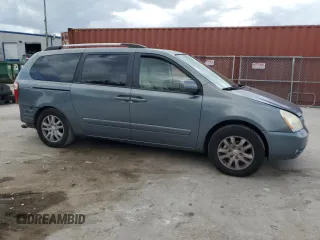 2009 Kia Sedona EX with VIN KNDMB233396299667, listed as a Copart auction lot 80186774 with 197,328 mi miles and Salvage Title. Bid and sale history available at carsss.com. Image 4.
