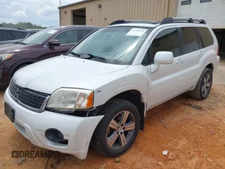 2011 Mitsubishi Endeavor z VIN 4A4JM3AS2BE037110, wystawiony jako IAAI lot #42106914 z przebiegiem 160 327 mil mil oraz . Historia ofert i sprzedaży dostępna na DreamBid. Obrazek 2.