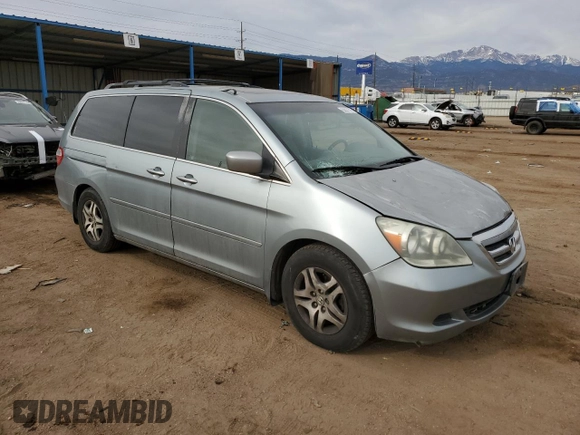 2005 Honda Odyssey EX-L with VIN 5FNRL38715B116530, listed as a Copart auction lot 50807575 with 216,434 mi miles and Salvage Title. Bid and sale history available at DreamBid. Image 4.