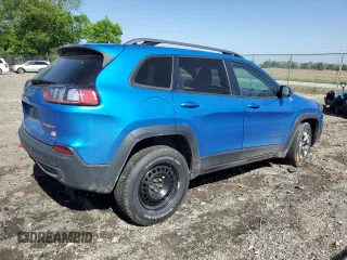 2019 Jeep Cherokee Trailhawk with VIN 1C4PJMBX9KD393862, listed as a Copart auction lot 56695905 with 64,334 mi miles and Salvage title. Bid and sale history available at DreamBid. Image 3.