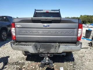2021 Ford Super Duty F-250 SRW XL with VIN 1FT7X2B6XMEC80607, listed as a Copart auction lot 76134304 with 57,912 mi miles and Salvage Title. Bid and sale history available at carsss.com. Image 6.