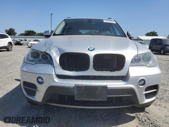2012 BMW X5 35i with VIN 5UXZV4C5XCL751020, listed as a Copart auction lot 59327845 with 106,249 mi miles and Salvage title. Bid and sale history available at DreamBid. Image 5.