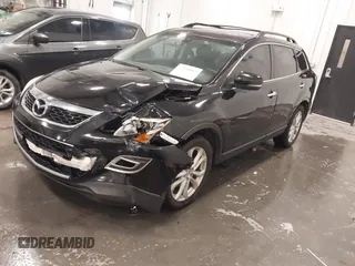 2011 Mazda CX-9 Grand Touring z VIN JM3TB3DA8B0329437, wystawiony jako IAAI lot #42243017 z przebiegiem 250 572 mil mil oraz . Historia ofert i sprzedaży dostępna na DreamBid. Obrazek 2.