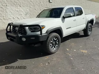 2023 Toyota Tacoma SR with VIN 3TMCZ5AN2PM618731, listed as a Copart auction lot 84292445 with 10,306 mi miles and Salvage title. Bid and sale history available at DreamBid. Image 11.