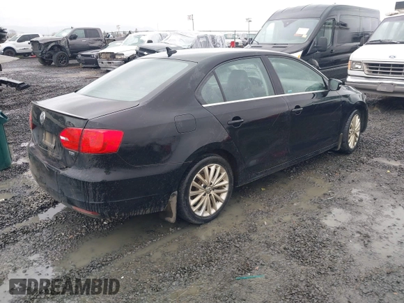 2014 Volkswagen Jetta TDI w/Premium with VIN 3VWLL7AJ1EM406360, listed as a IAAI auction lot 41857580 with 93,333 mi miles and . Bid and sale history available at DreamBid. Image 4.