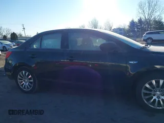 2010 Suzuki Kizashi SE with VIN JS2RE9A34A6100807, listed as a IAAI auction lot 41690974 with 122,419 mi miles and . Bid and sale history available at DreamBid. Image 13.