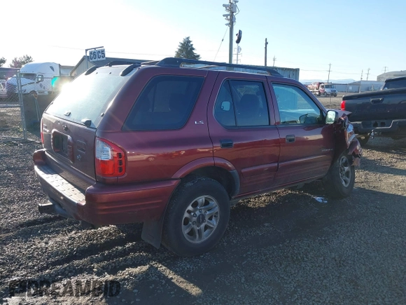 2002 Isuzu Rodeo with VIN 4S2DM58W624335632, listed as a IAAI auction lot 41690735 with 186,480 mi miles and . Bid and sale history available at DreamBid. Image 4.