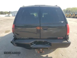1999 GMC Denali with VIN 1GKEK13R1XR912632, listed as a Copart auction lot 51223085 with 223,201 mi miles and Salvage Title. Bid and sale history available at carsss.com. Image 6.