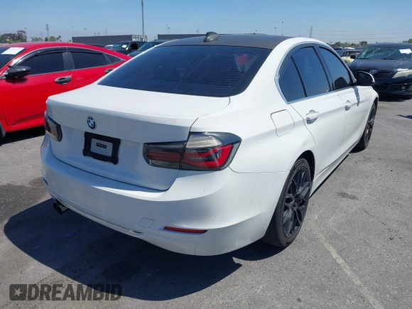 2012 BMW 3 Series 328i with VIN WBA3A5C50CF342206, listed as a IAAI auction lot 42008940 with 130,164 mi miles. Bid and sale history available at carsss.com. Image 4.