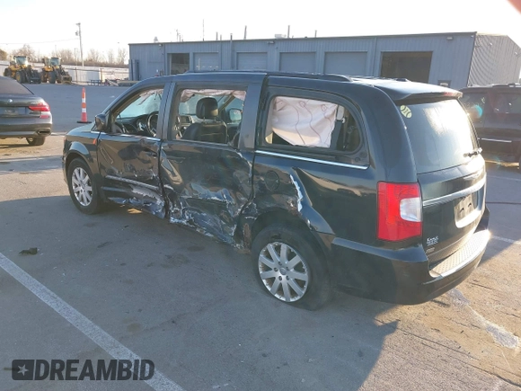 2014 Chrysler Town & Country Touring with VIN 2C4RC1BGXER124367, listed as a IAAI auction lot 41888366 with 143,638 mi miles and . Bid and sale history available at DreamBid. Image 3.