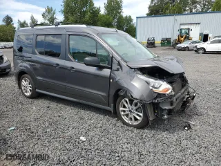 2017 Ford Transit Connect Wagon XLT with VIN NM0GS9F74H1301052, listed as a Copart auction lot 67001674 with 75,754 mi miles and Salvage Title. Bid and sale history available at carsss.com. Image 4.