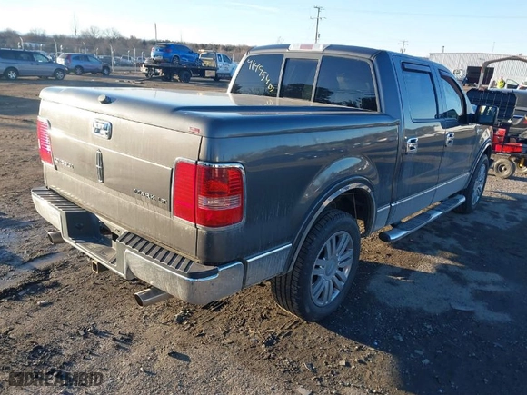 2007 Lincoln Mark LT with VIN 5LTPW16557FJ03103, listed as a IAAI auction lot 41445407 with 118,083 mi miles. Bid and sale history available at carsss.com. Image 4.