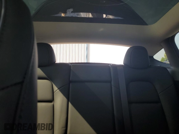 2024 Tesla Model Y Long Range with VIN 7SAYGDEE4RF032154, listed as a Copart auction lot 61973635 with 10,022 mi miles and Salvage title. Bid and sale history available at DreamBid. Image 10.