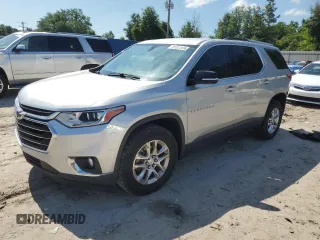 2018 Chevrolet Traverse LT Cloth with VIN 1GNERGKW7JJ282002, listed as a Copart auction lot 61564495 with 105,048 mi miles and Salvage title. Bid and sale history available at DreamBid. Image 1.