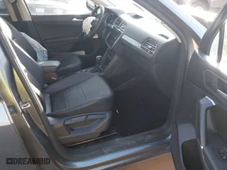 2020 Volkswagen Tiguan SE with VIN 3VV2B7AX9LM151977, listed as a IAAI auction lot 41448053 with 69,194 mi miles. Bid and sale history available at carsss.com. Image 5.