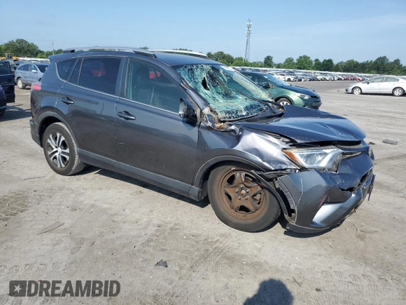 2017 Toyota RAV4 LE with VIN JTMBFREV2HD204349, listed as a Copart auction lot 63006825 with 141,795 mi miles and Salvage title. Bid and sale history available at DreamBid. Image 4.