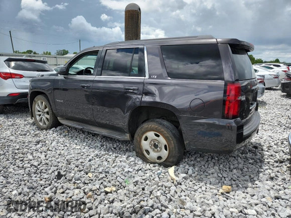 2015 Chevrolet Tahoe LT with VIN 1GNSCBKC8FR287747, listed as a Copart auction lot 62054665 with 201,691 mi miles and Salvage title. Bid and sale history available at DreamBid. Image 2.
