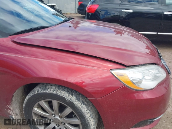 2011 Chrysler 200 Touring z VIN 1C3BC1FB4BN569474, wystawiony jako IAAI lot #42329937 z przebiegiem 160 695 mil mil oraz . Historia ofert i sprzedaży dostępna na DreamBid. Obrazek 14.